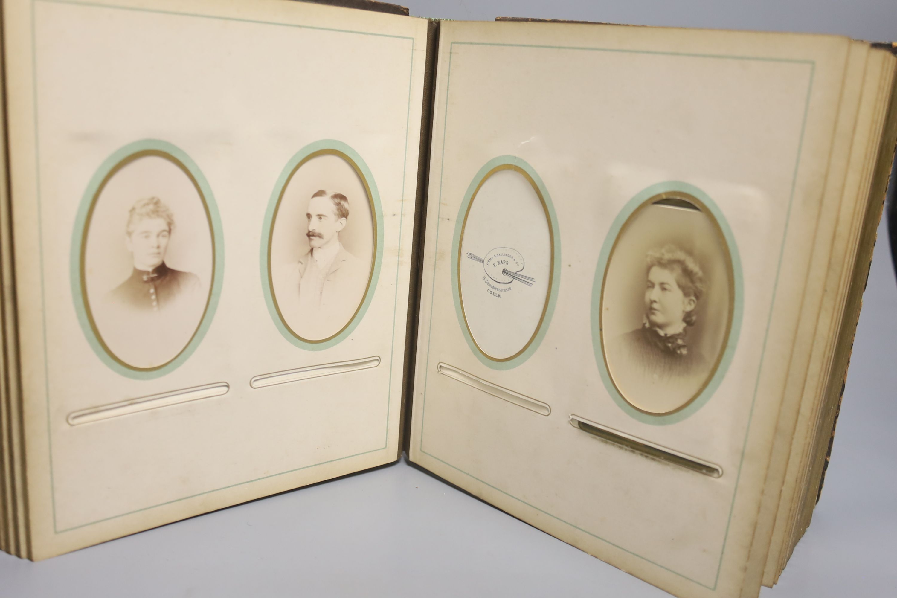 A photographic print of Richard Holt Hutton (1826-1897) by Frederick Hollyer and a Victorian family photograph album